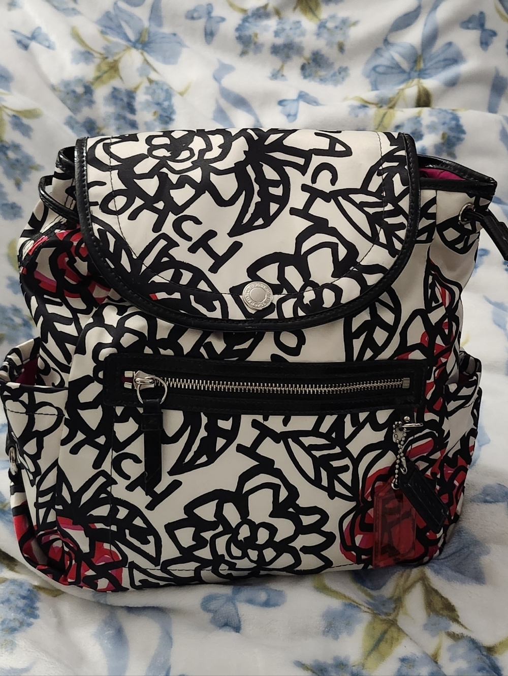 Coach Poppy Backpack White Floral Graphic with Black and Pink Accents
